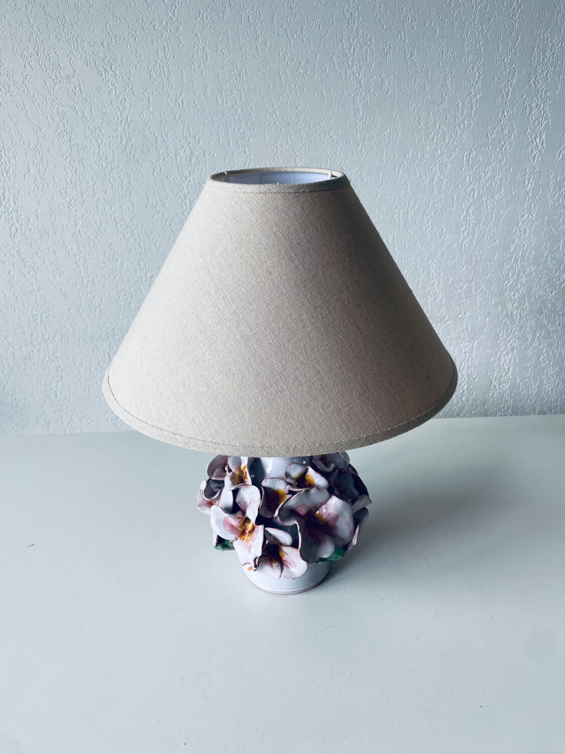 Terracotta lamp flower in relief