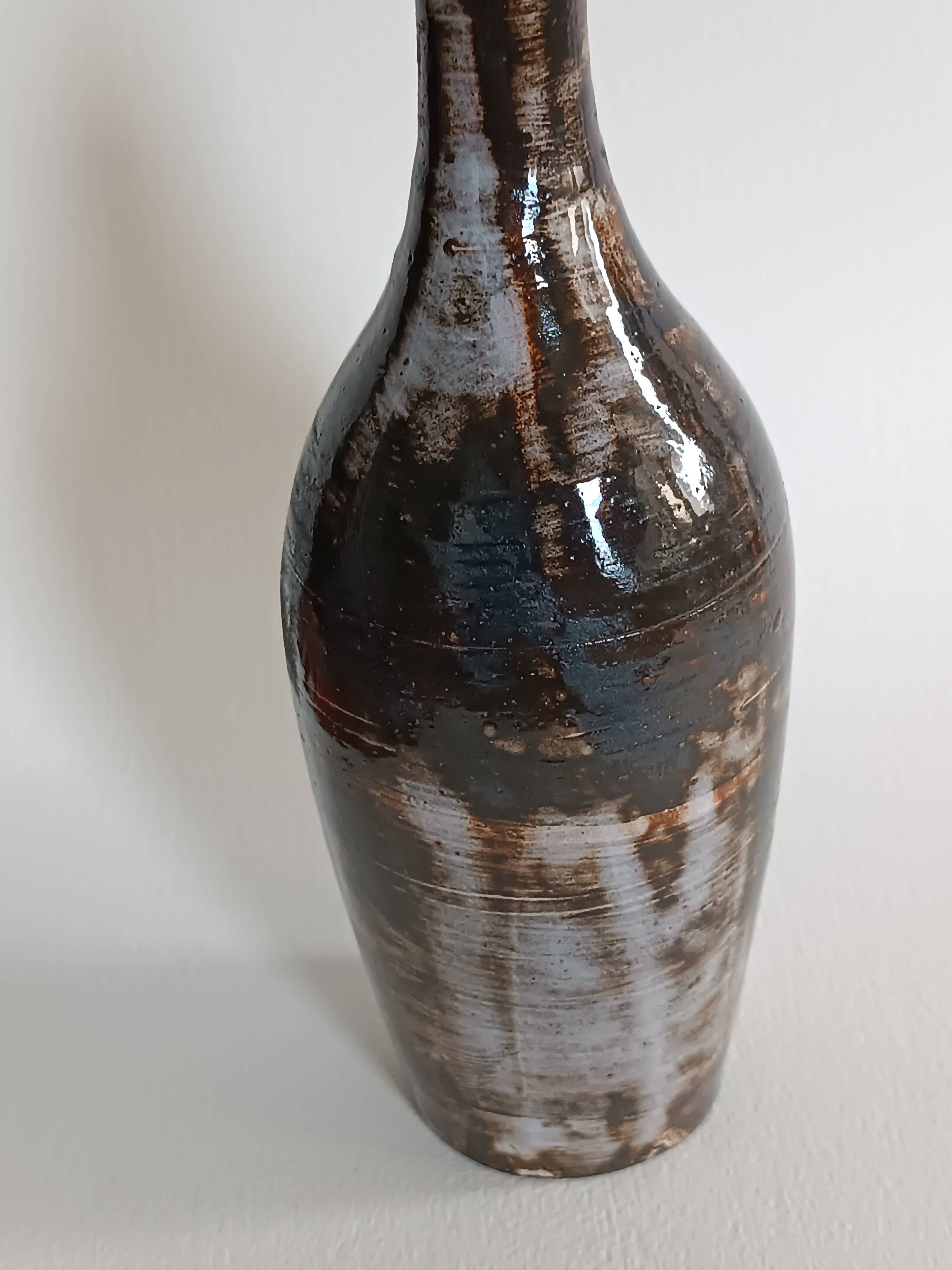 A bottle and six ceramic cups by Gérard Hofmann Vallauris 1950.