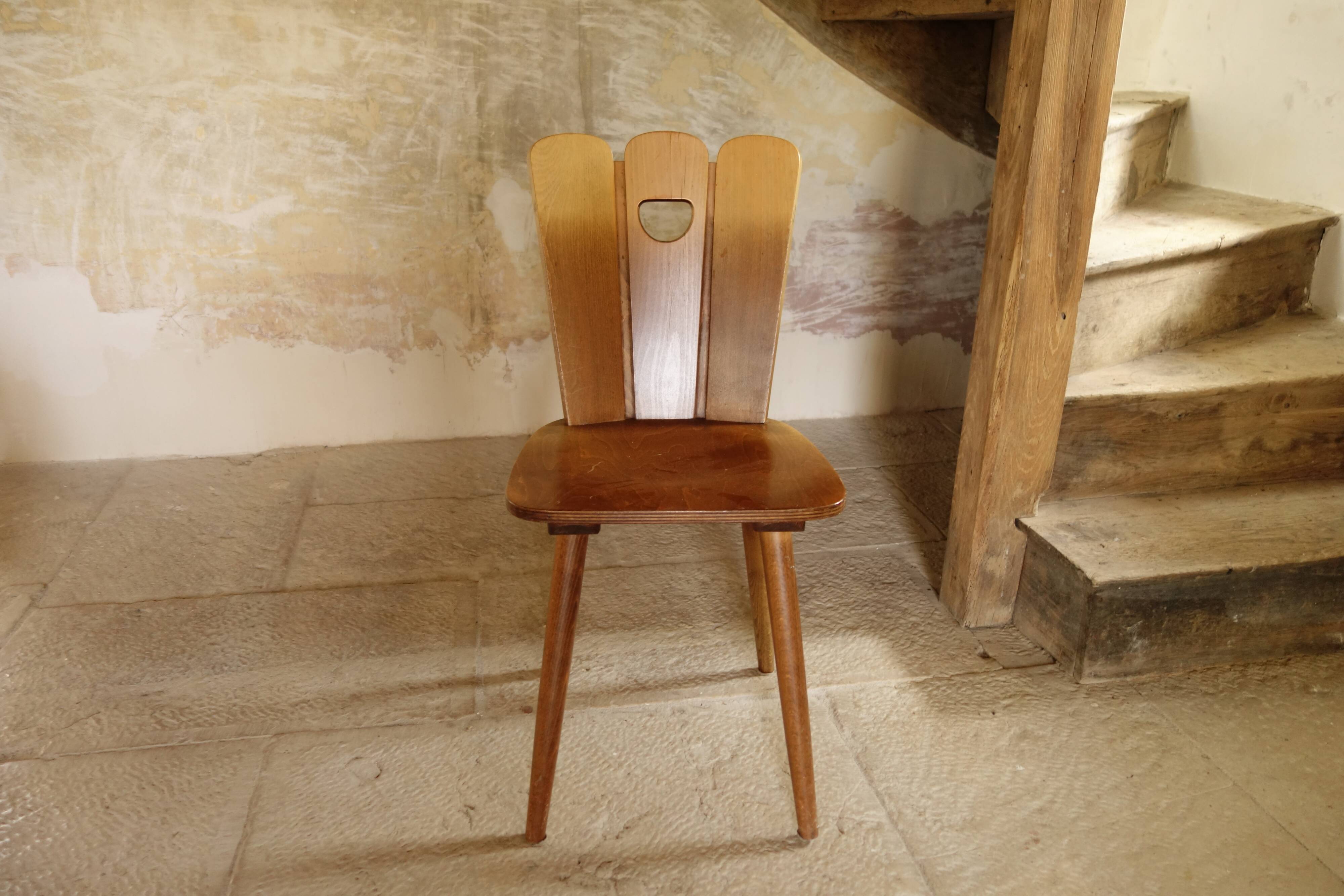 Scandinavian midcentury wooden chairs.