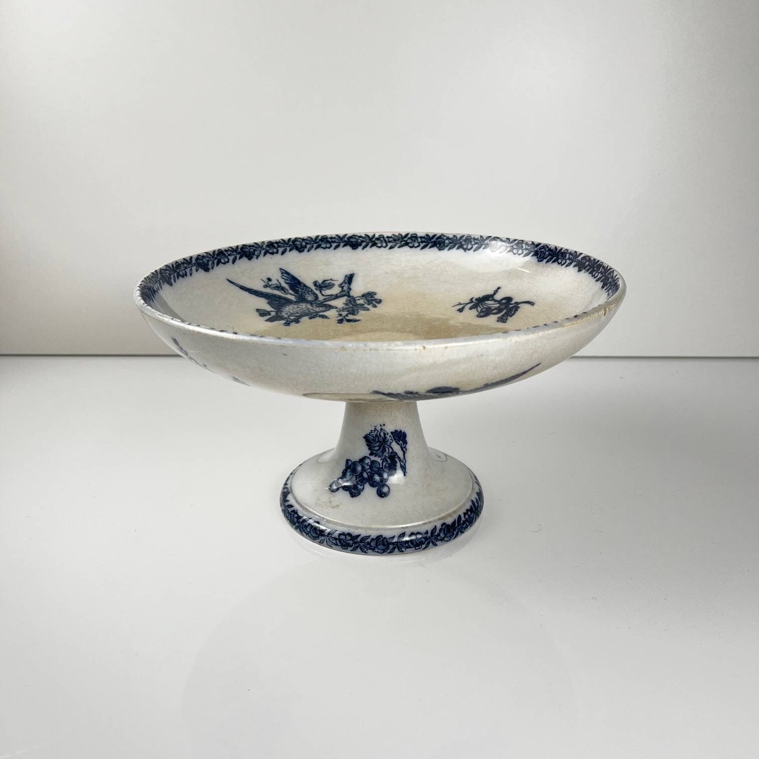 Pexonne iron earth compote dish, blue bird motif, late 19th century