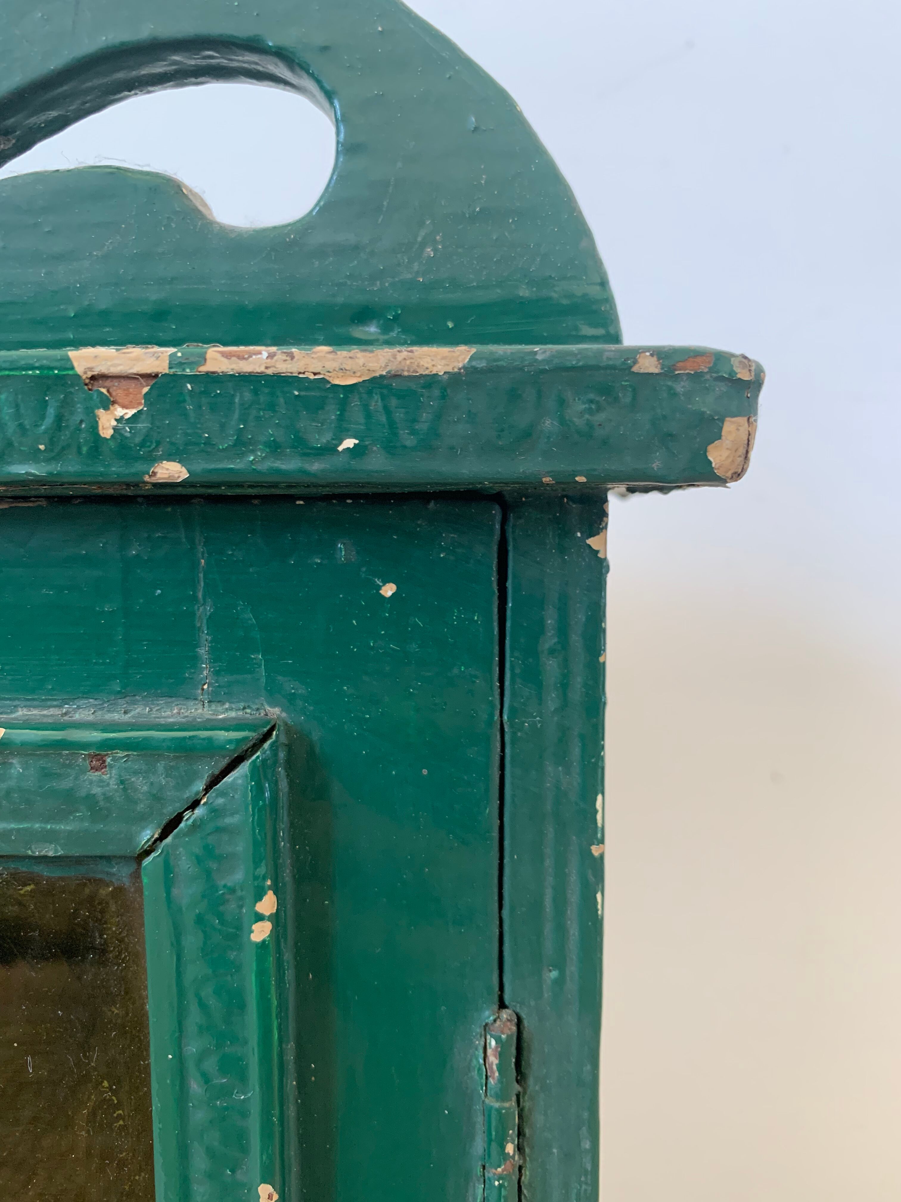 Wall vitrin with pediment