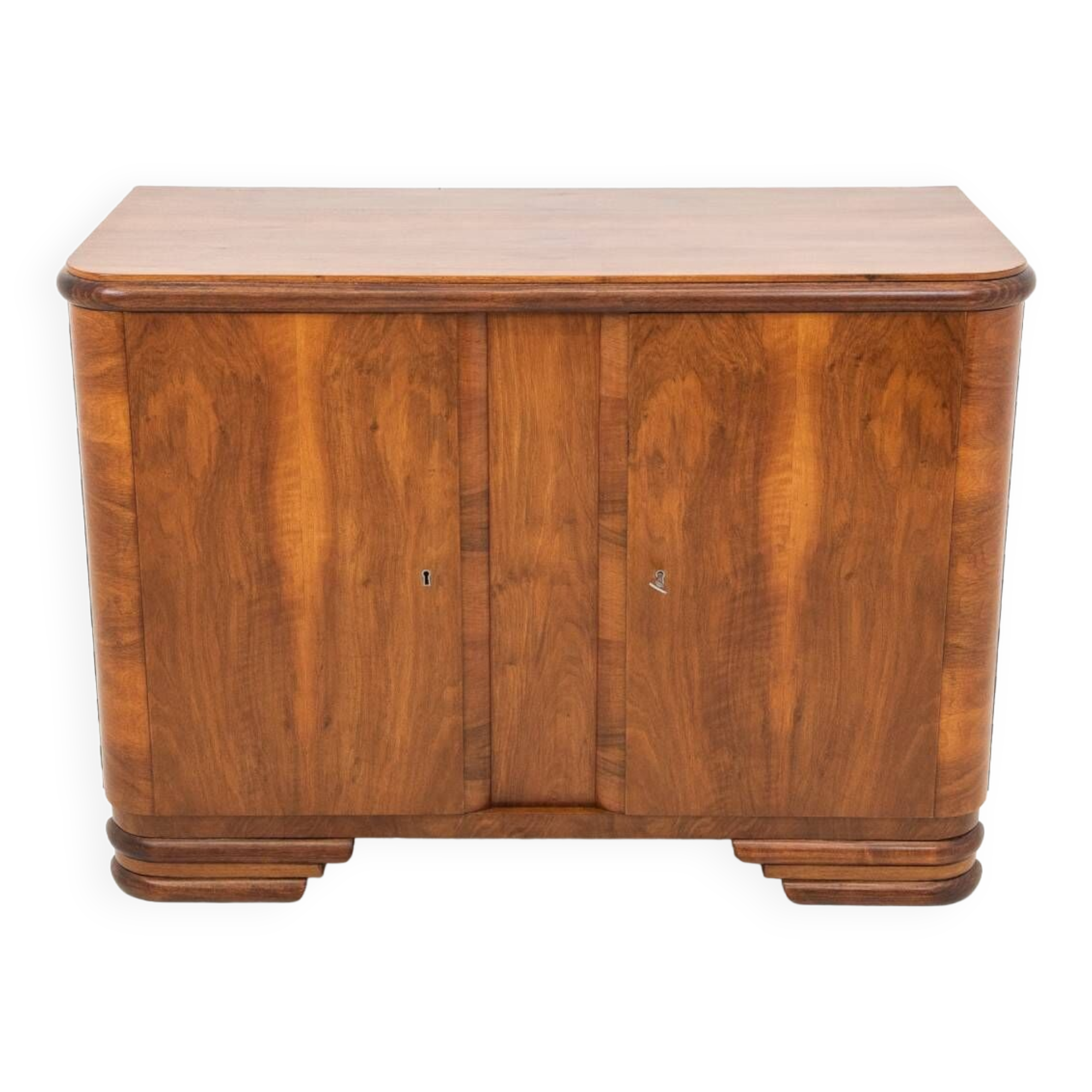 Art Deco style walnut chest of drawers, Poland, 1950s.