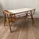 Tabler basse en rotin avec porte-revues