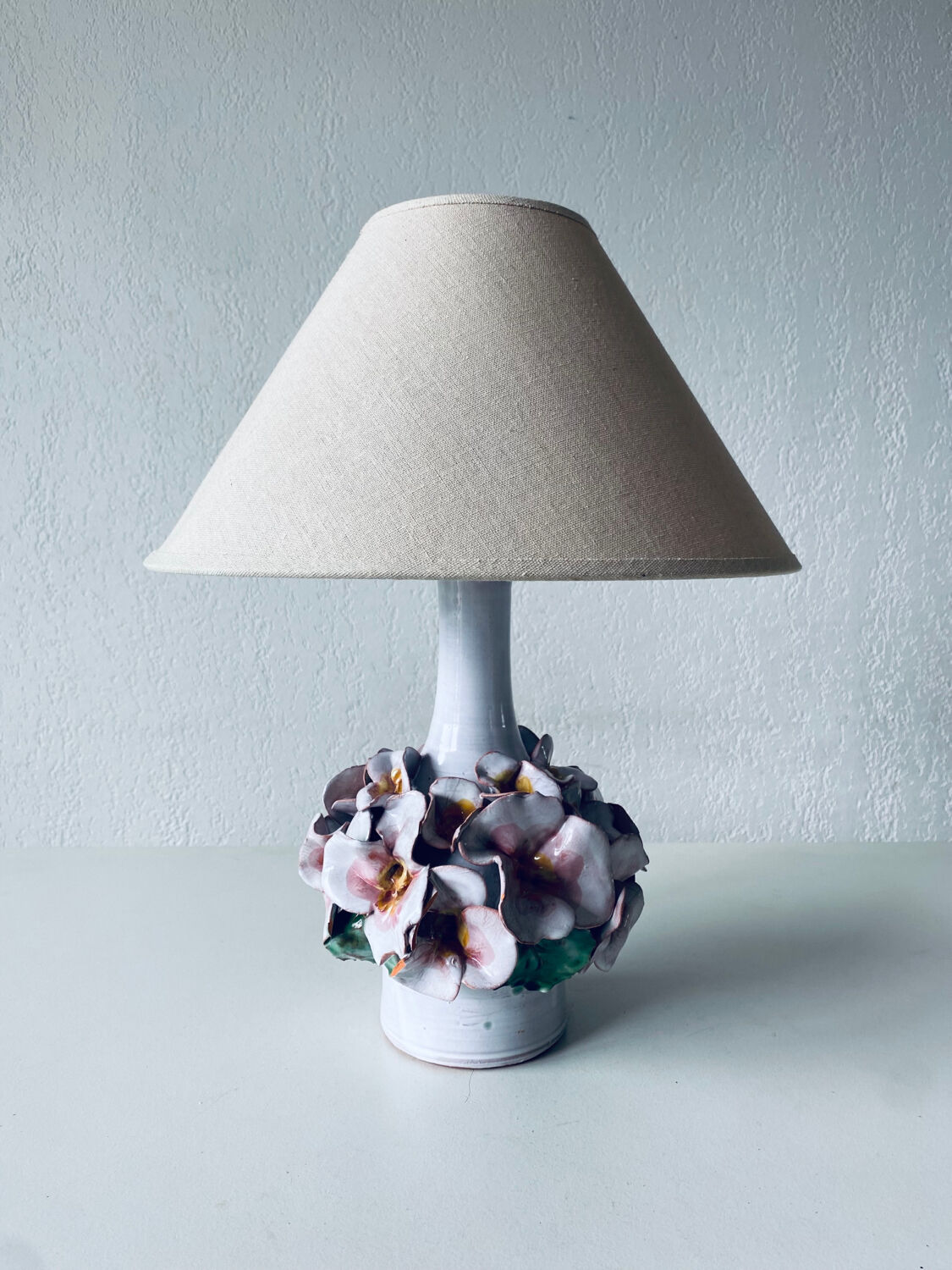 Terracotta lamp flower in relief