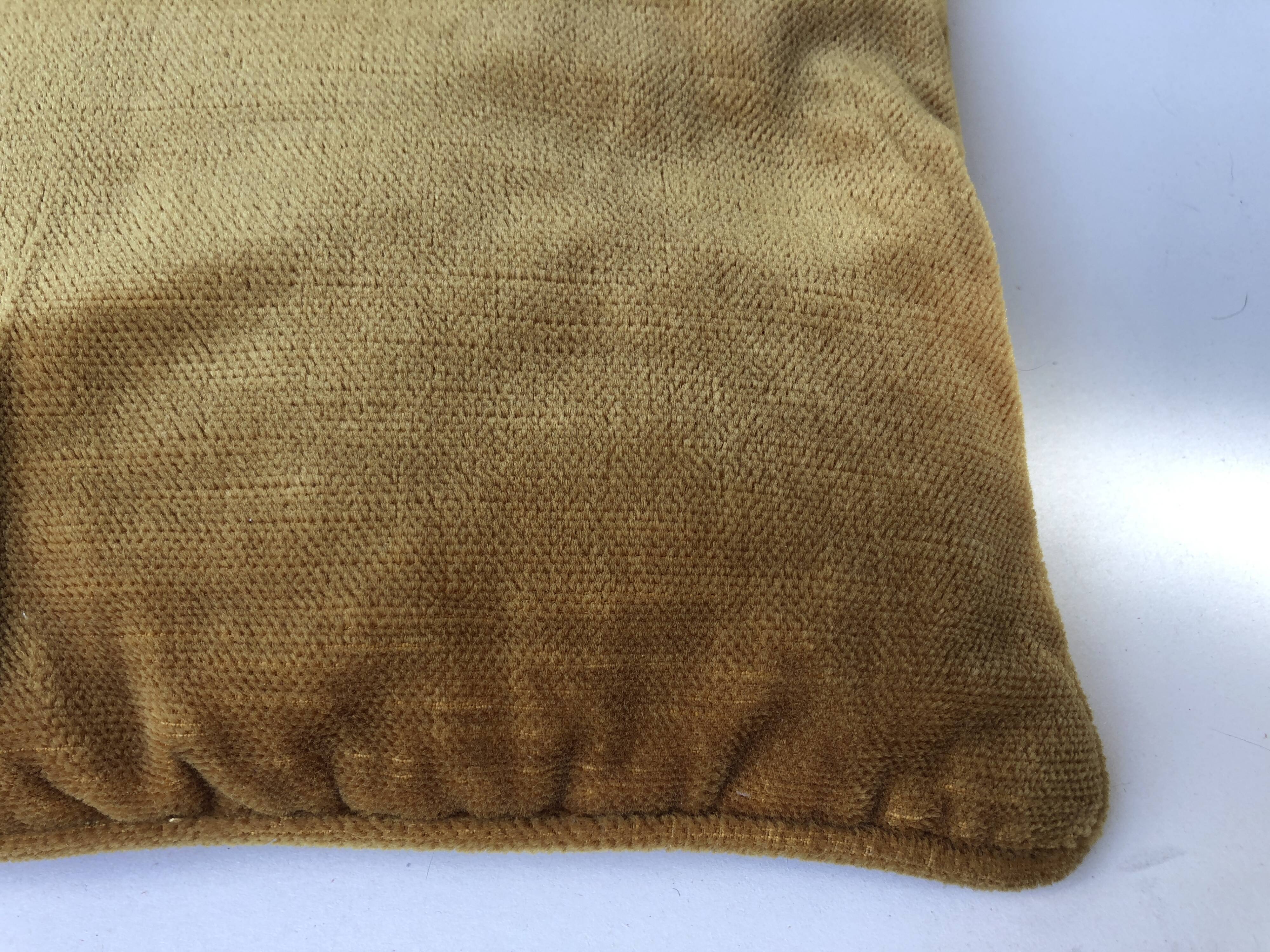 Golden yellow color velvet cushion