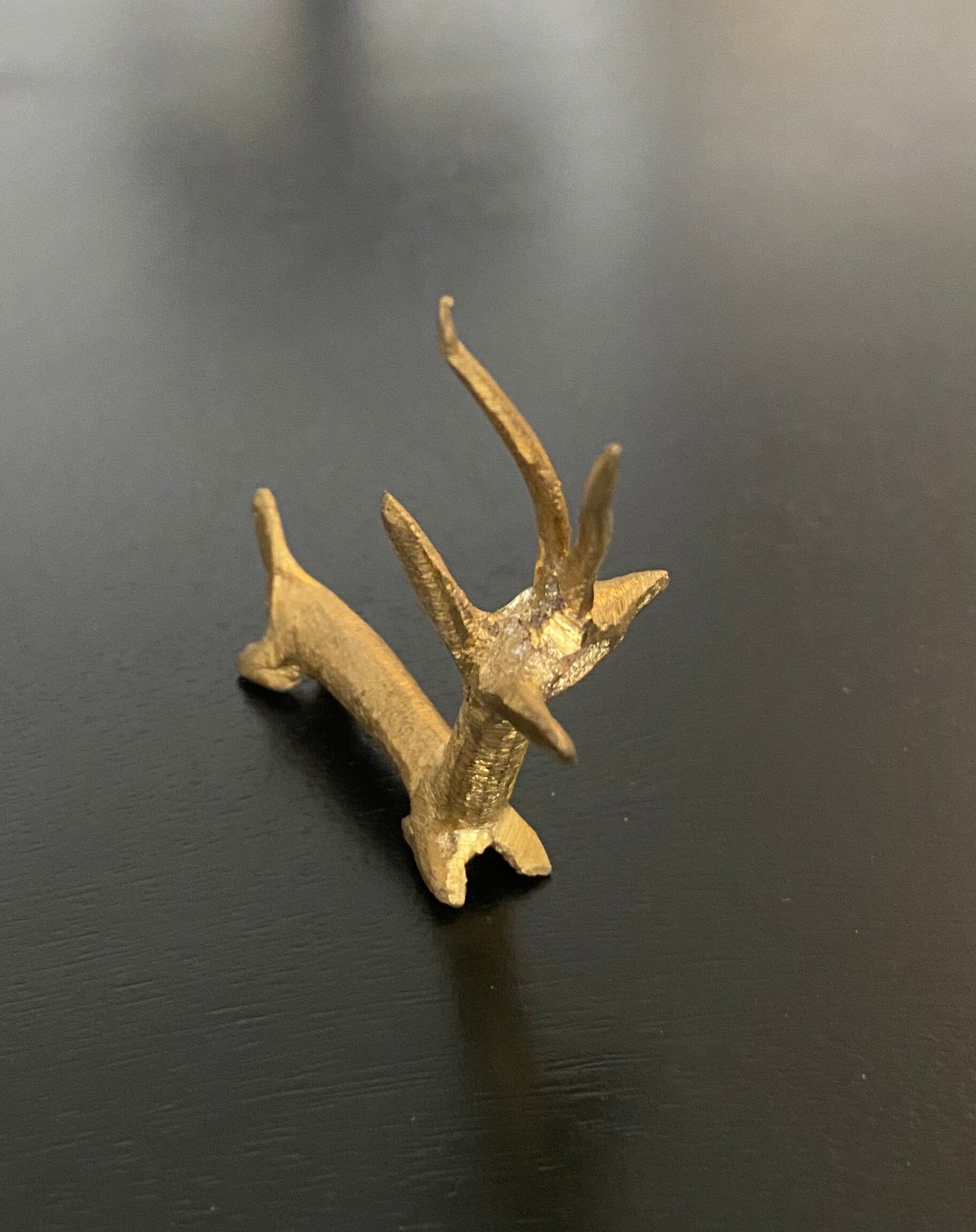8 porte-couteaux forme antilope et crocodile en laiton