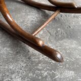 Warm walnut bentwood and cane child's rocking chair early 20th-century