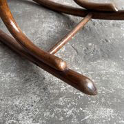 Warm walnut bentwood and cane child's rocking chair early 20th-century