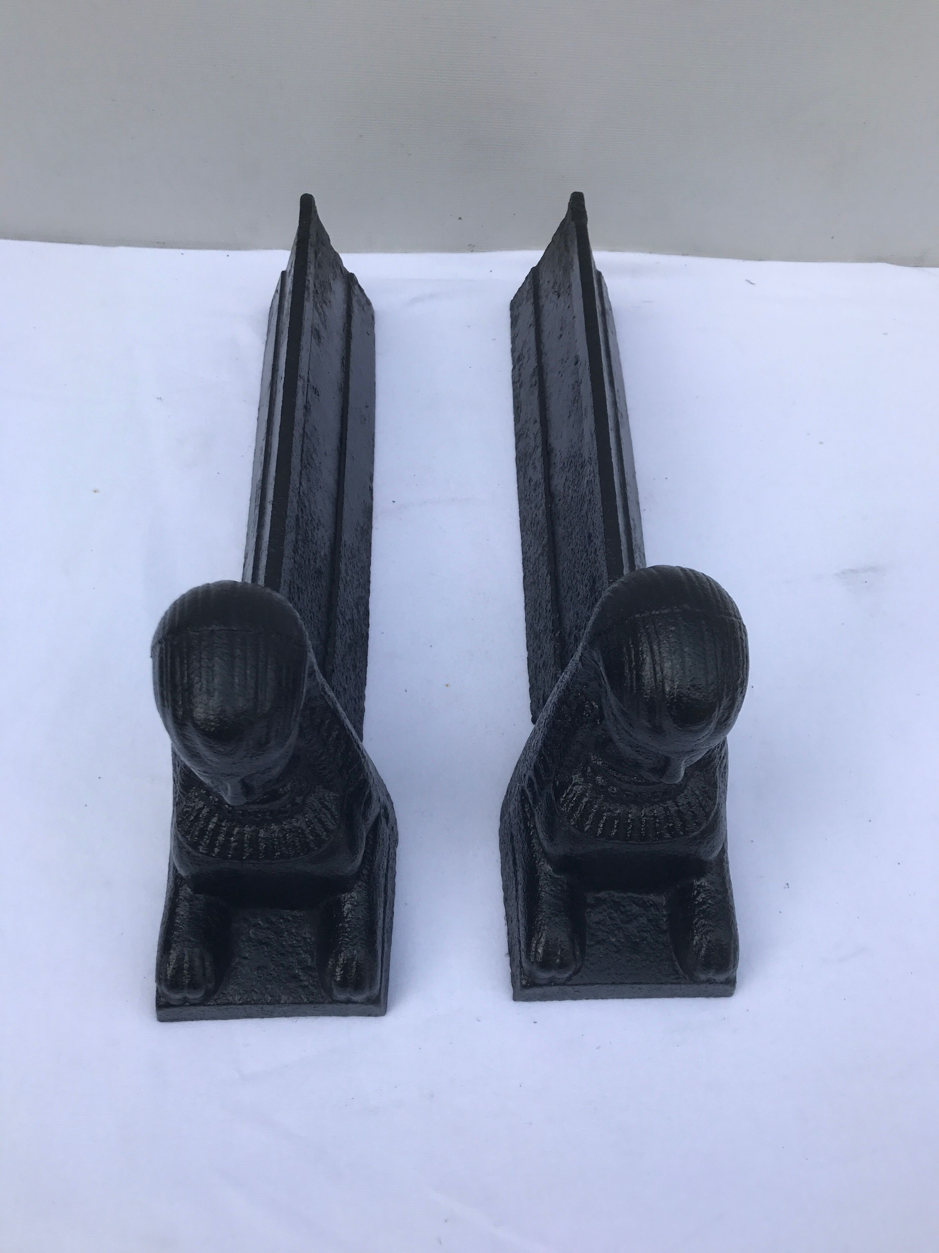 Former Egyptian cast-iron chenet in vintage black metal