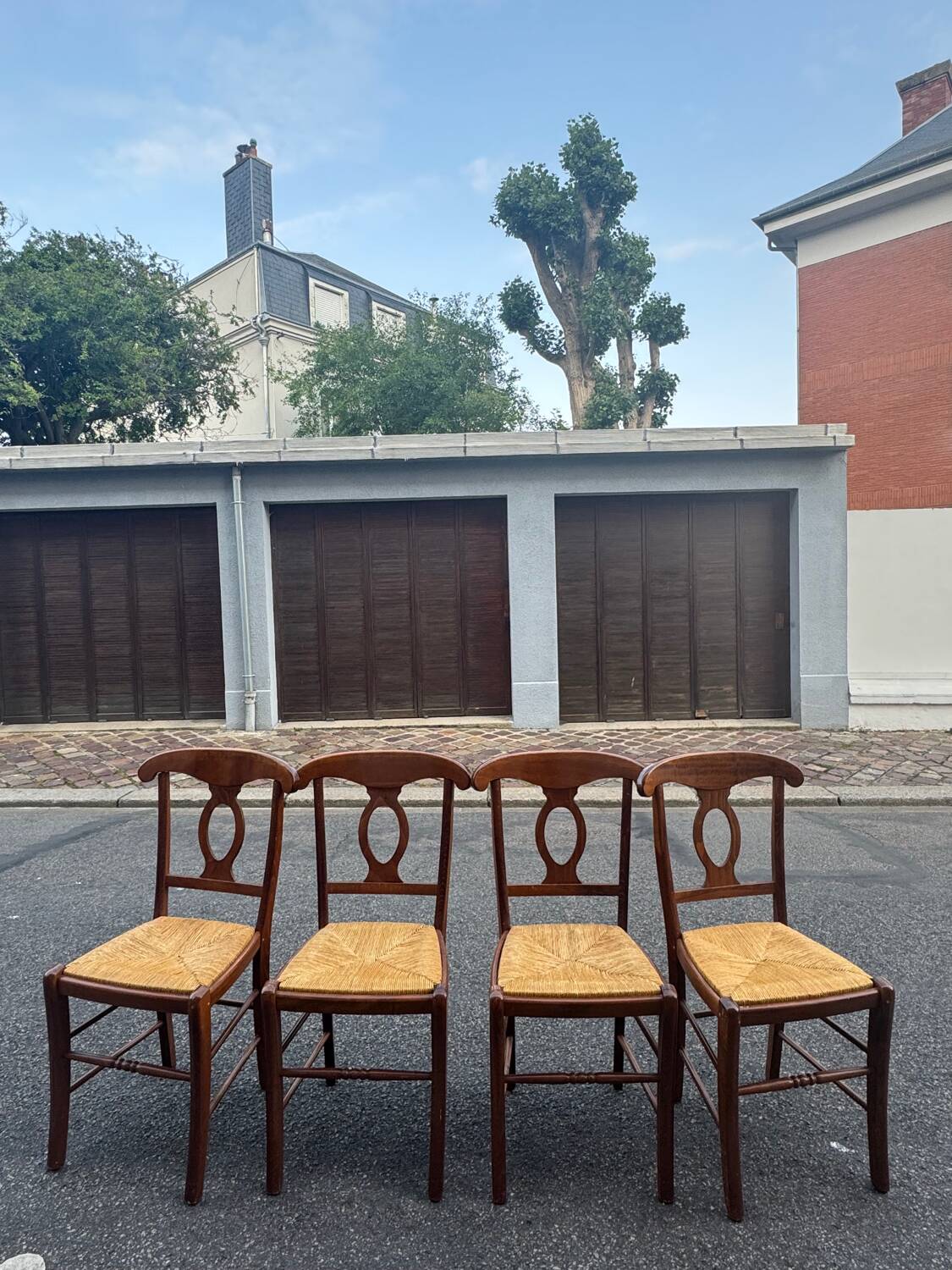 4 straw-seated chairs