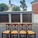 4 straw-seated chairs