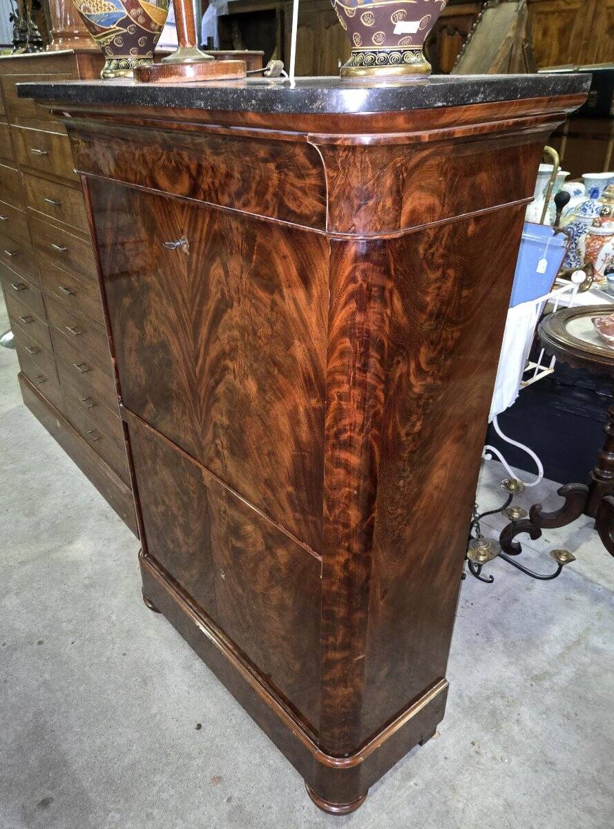 Flamed mahogany secretary from the Restoration period.