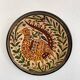 Glazed ceramic decorative plate