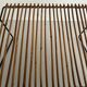 Mid-century black metal and rattan magazine rack, 1960, Italy