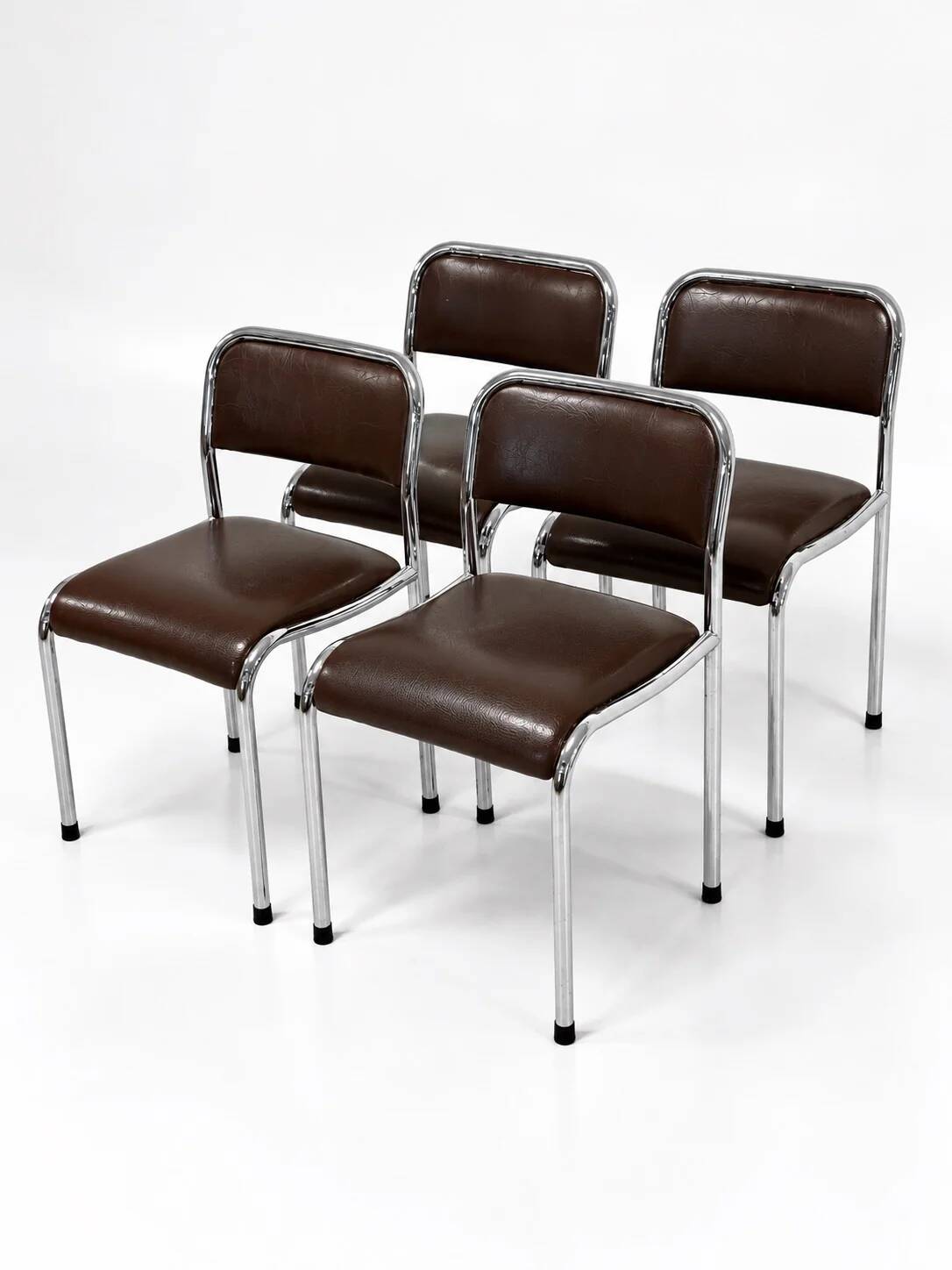 Set of 4 vintage dining chairs in chrome, brown faux leather, 1970s.