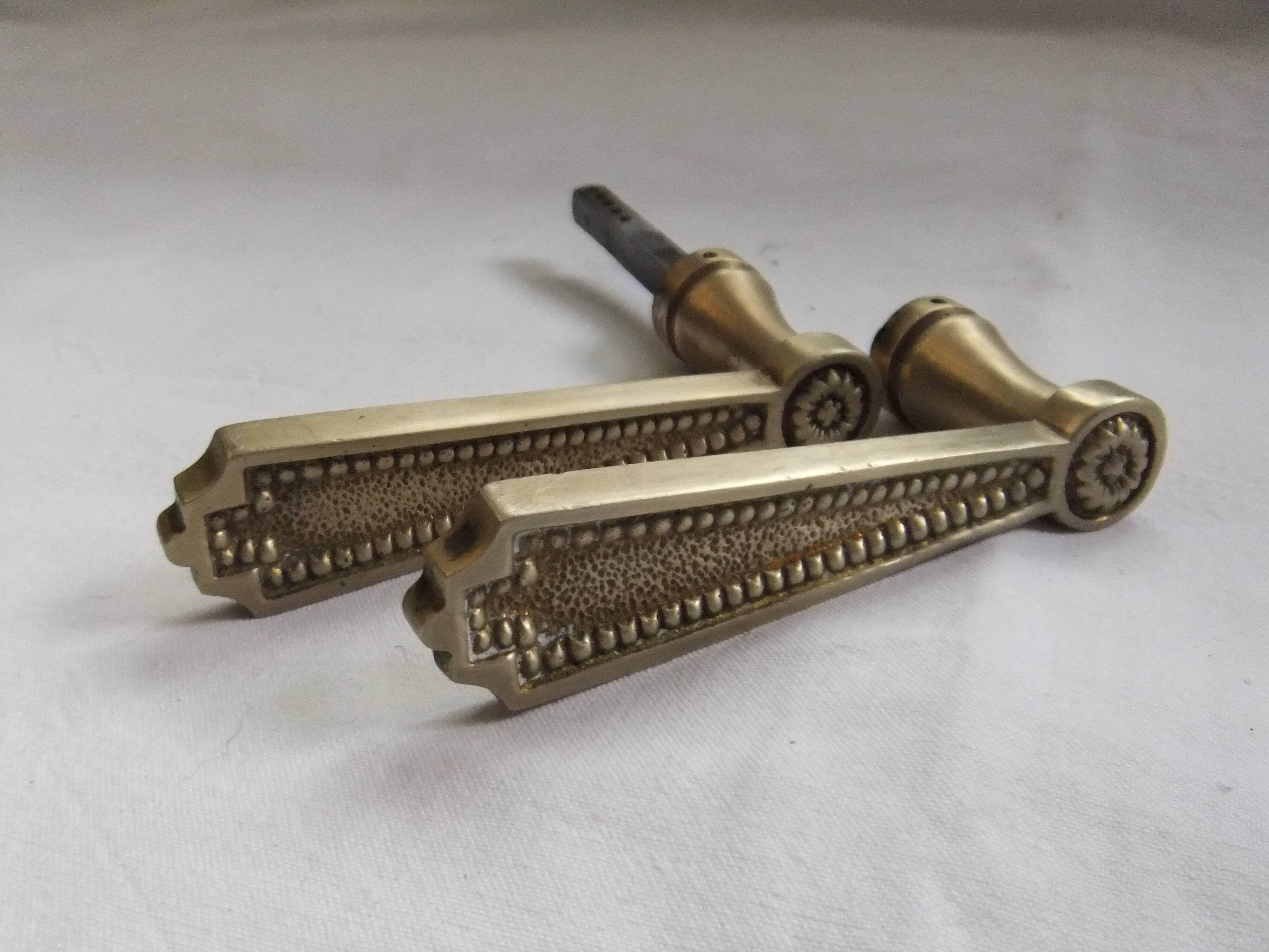 Pair of Louis XVI style beaded bronze door handles