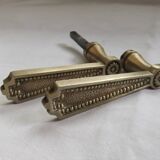 Pair of Louis XVI style beaded bronze door handles