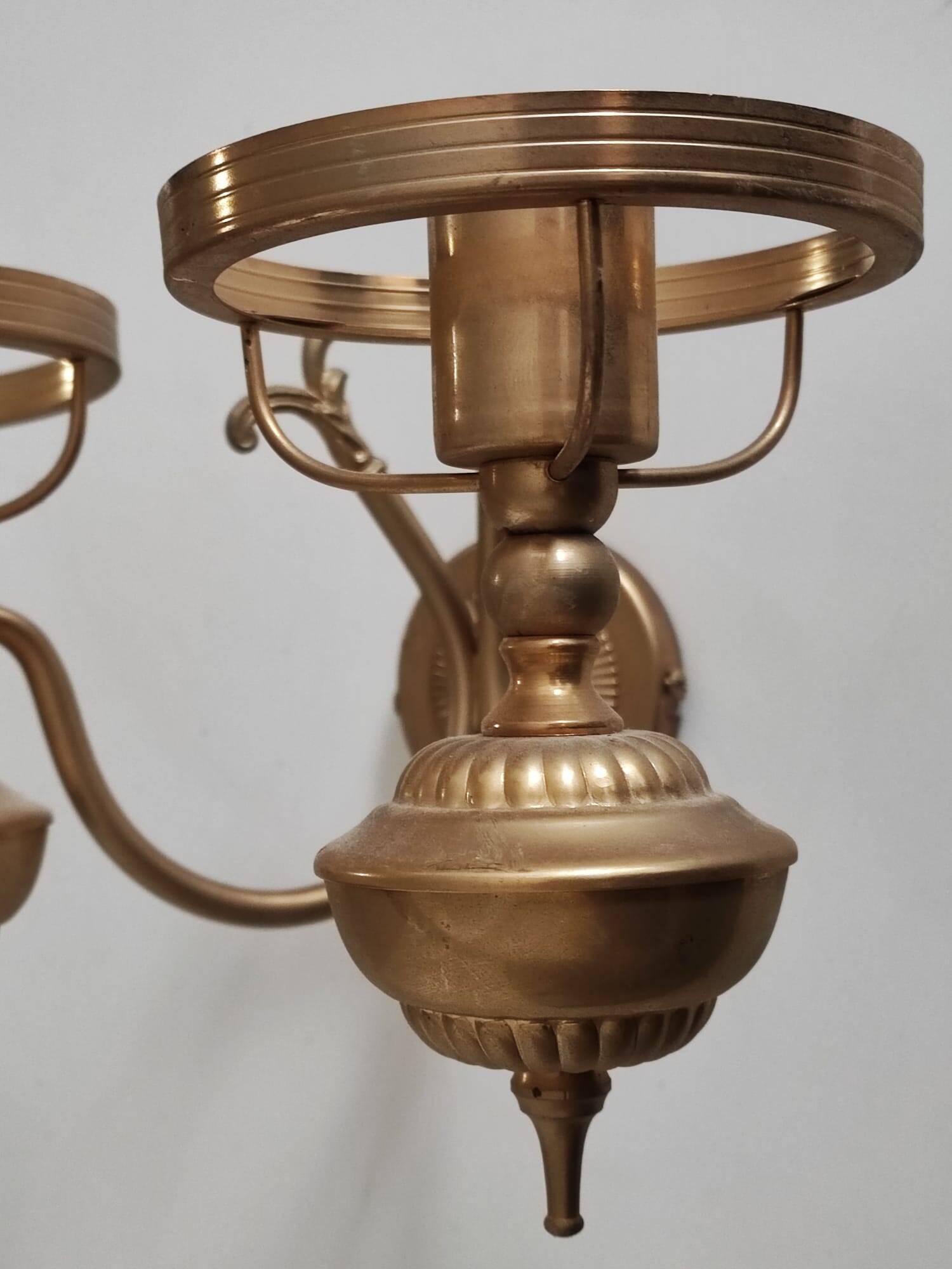 Antique brass wall sconce with two arms, Louis XV style.