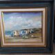 Antique oil painting depicting a seaside scene