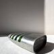 Vintage brushed aluminium vase with green stripes.