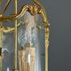 Cylindrical lantern in gilded bronze in the Louis XV style, 20th century.