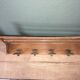 Wooden and metal coat rack