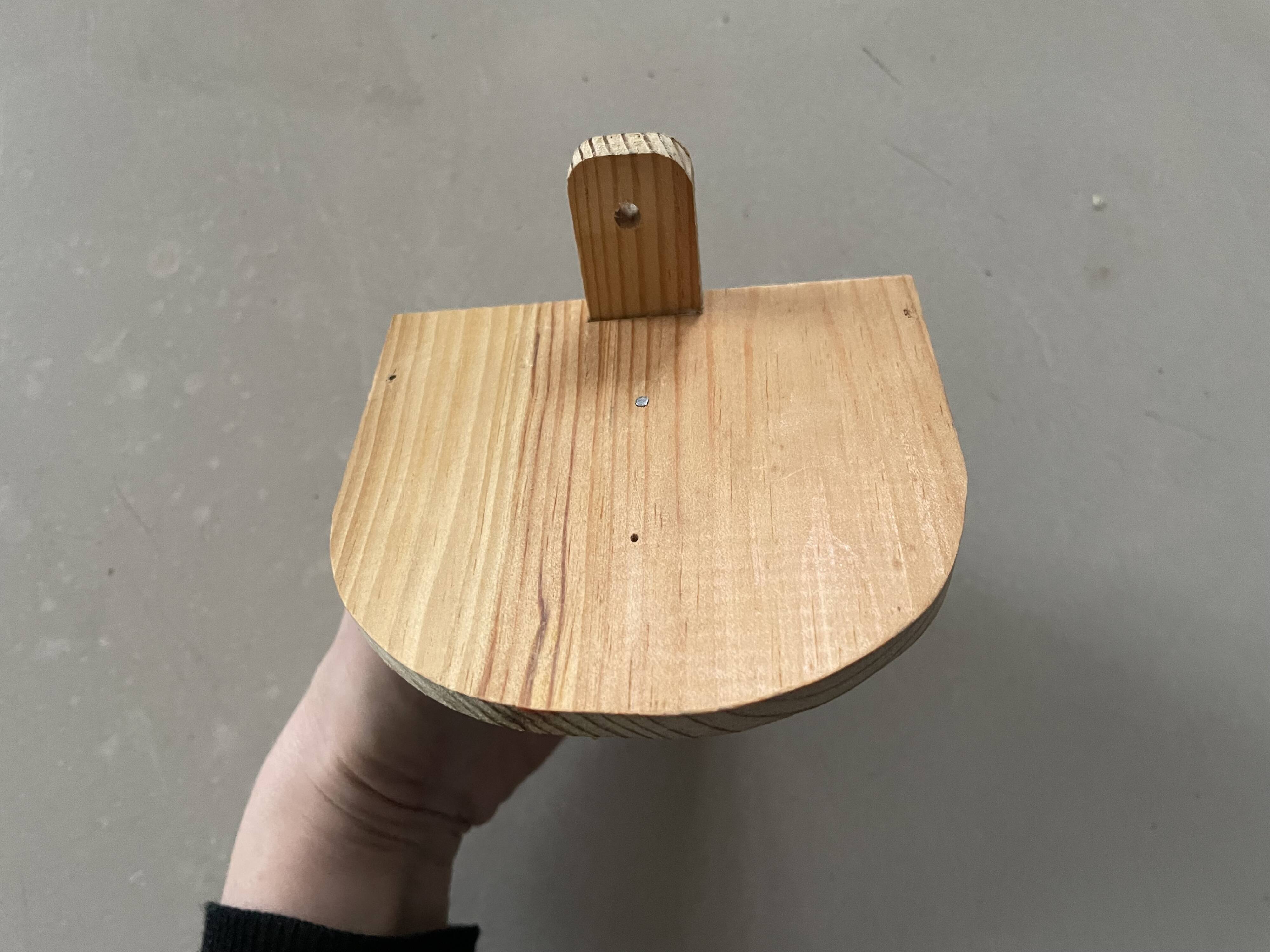 Small wall-mounted wooden shelf