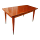 Mid-century vintage coffee table with tapered legs.