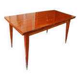 Mid-century vintage coffee table with tapered legs.