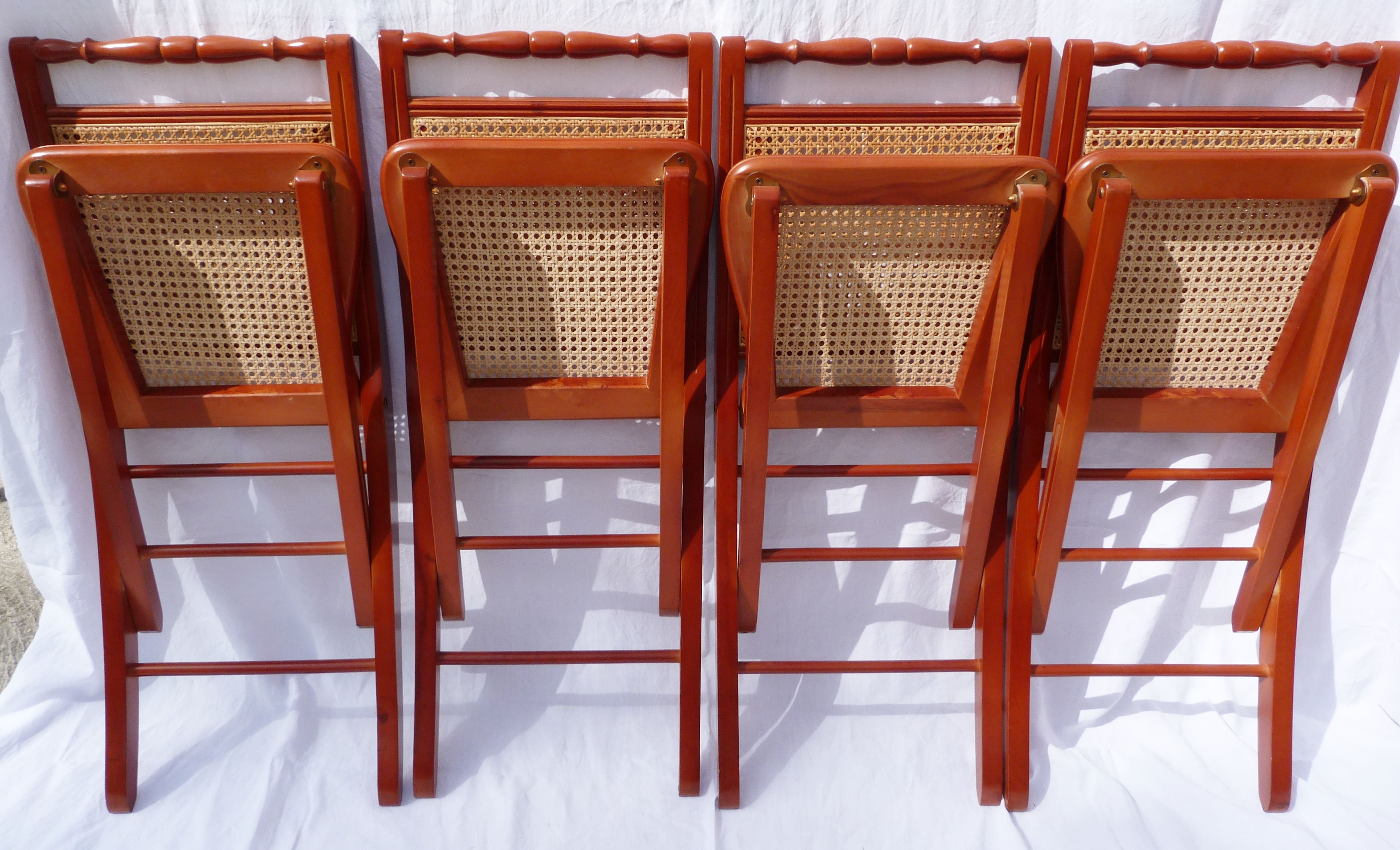 Set of 4 canned folding chairs