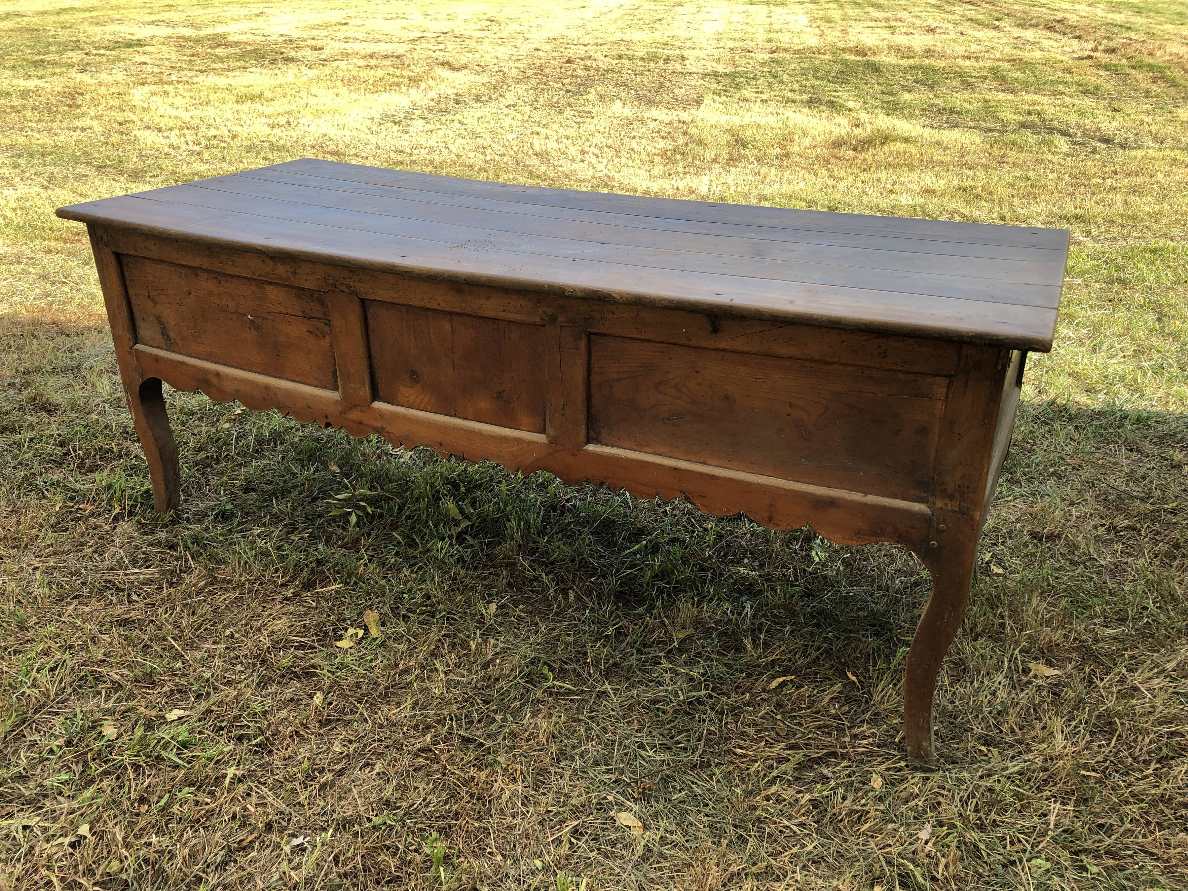 Antique Louis XV paneled table with 3 front drawers in solid cherry wood
