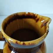 Glazed earthenware jug