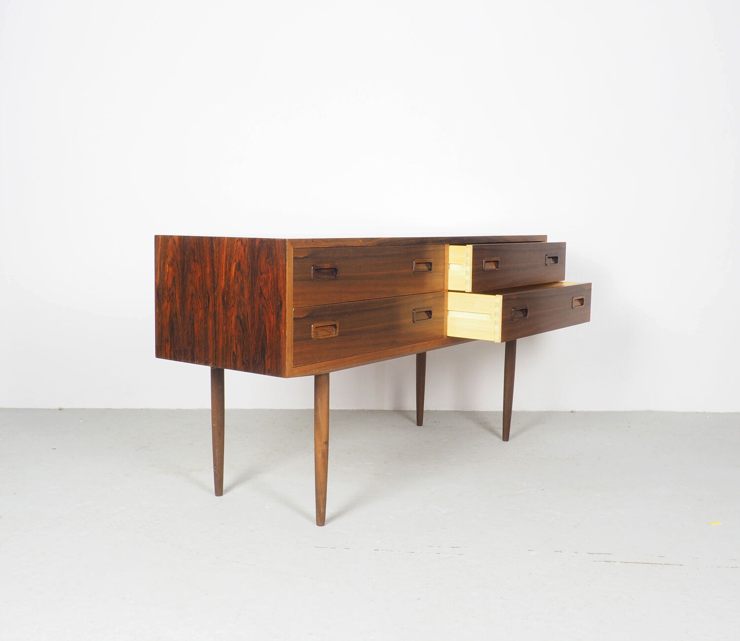 Hundevad Rosewood chest of drawers on high legs, 1960's