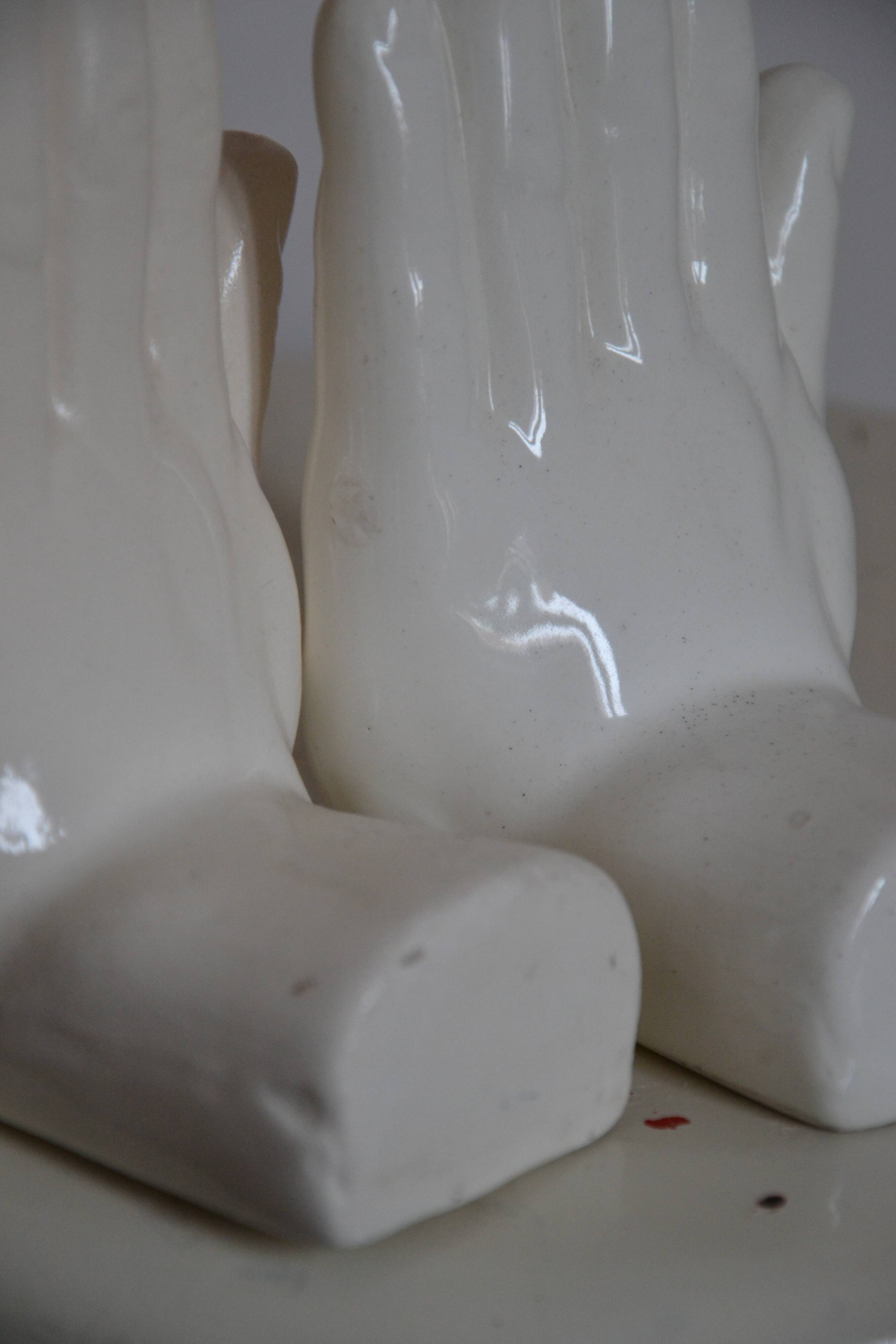 Handends in the shape of vintage white ceramic