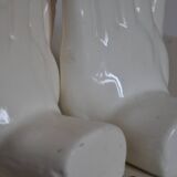 Handends in the shape of vintage white ceramic