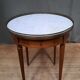 Table ronde dessus marbre
