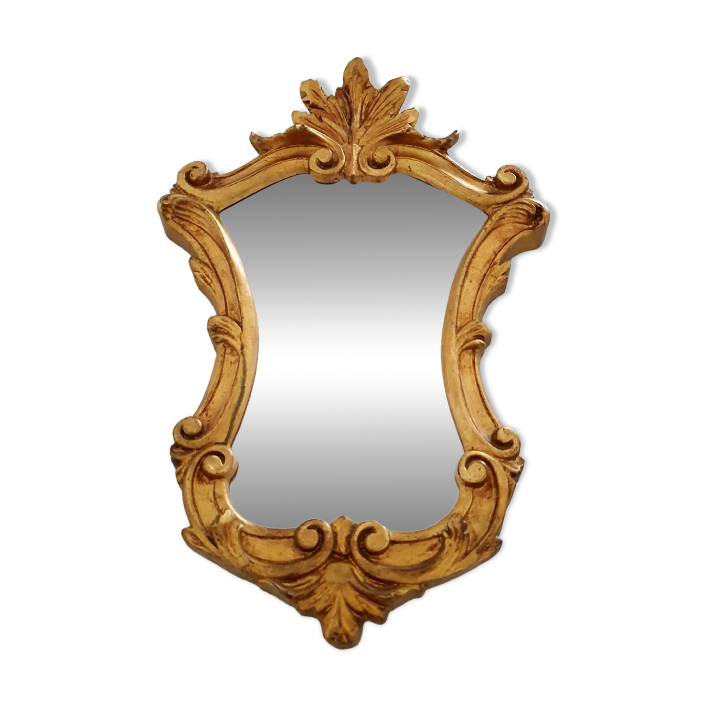 Baroque mirror gilded with gold leaf