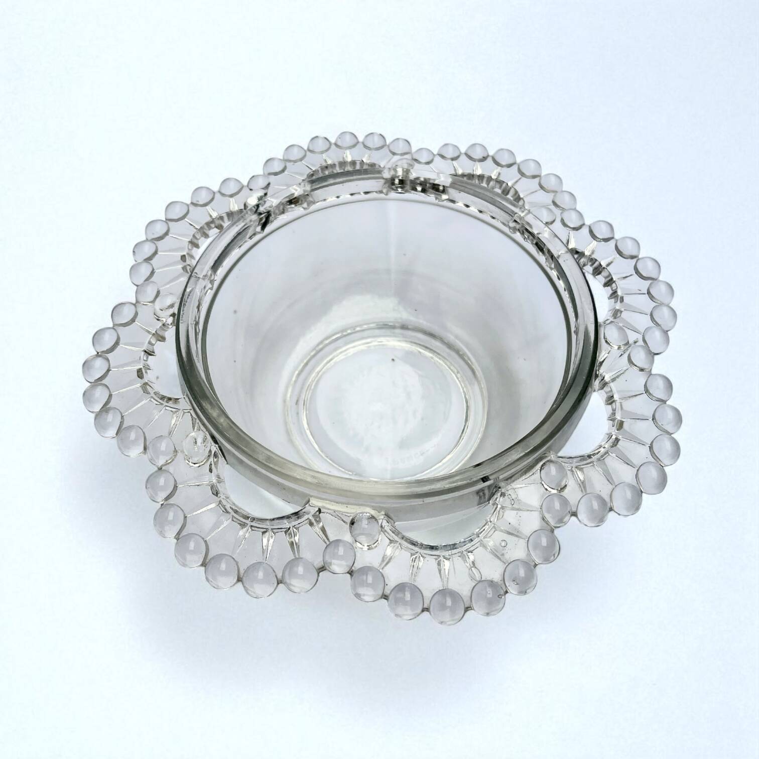 Glass salad bowl with beaded rim, 1900, Art Deco glass salad bowl in the shape of a flower