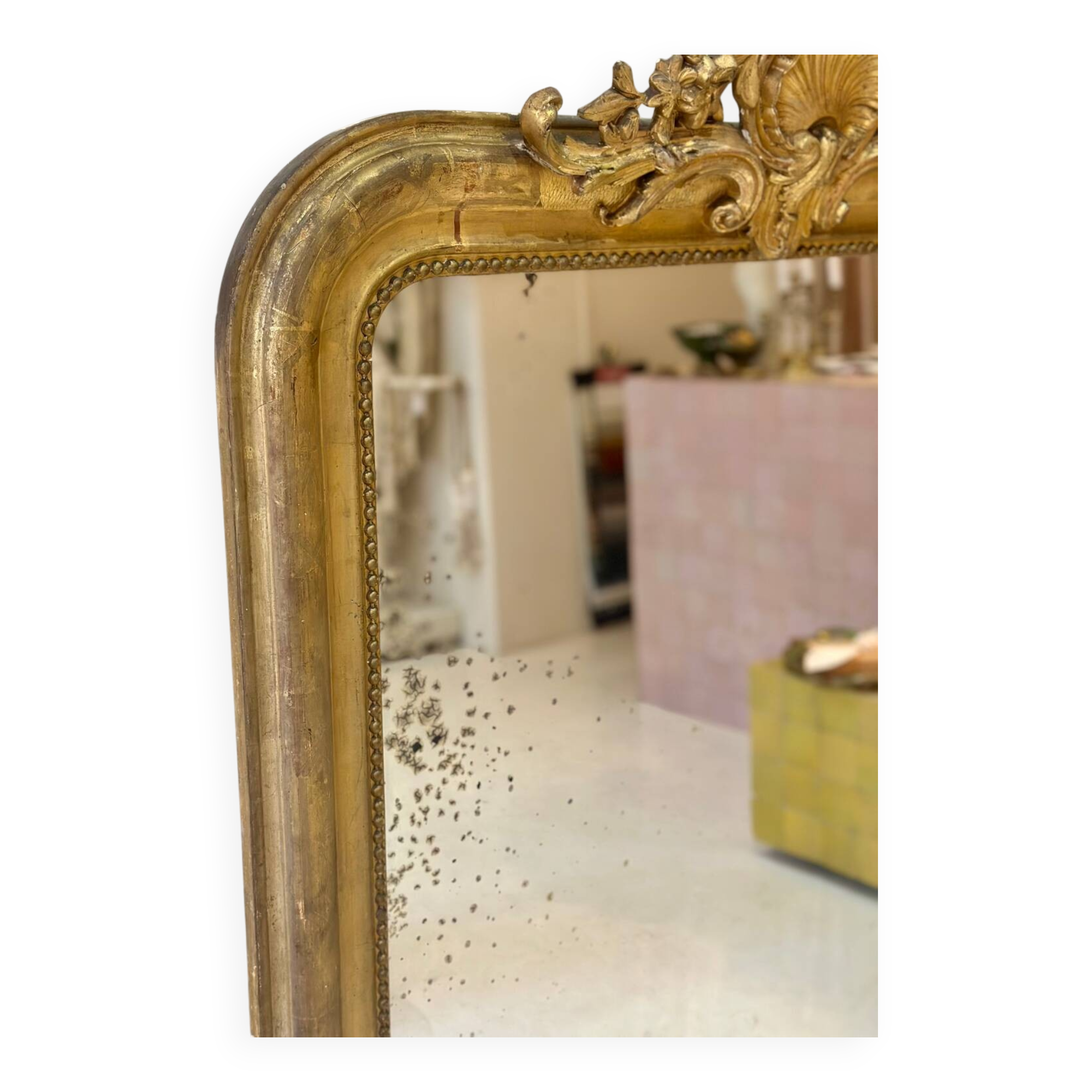 Antique Louis-Philippe mirror carved and gilded with leaf