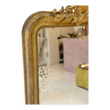 Miroir ancien Louis-Philippe sculpté et doré à la feuille