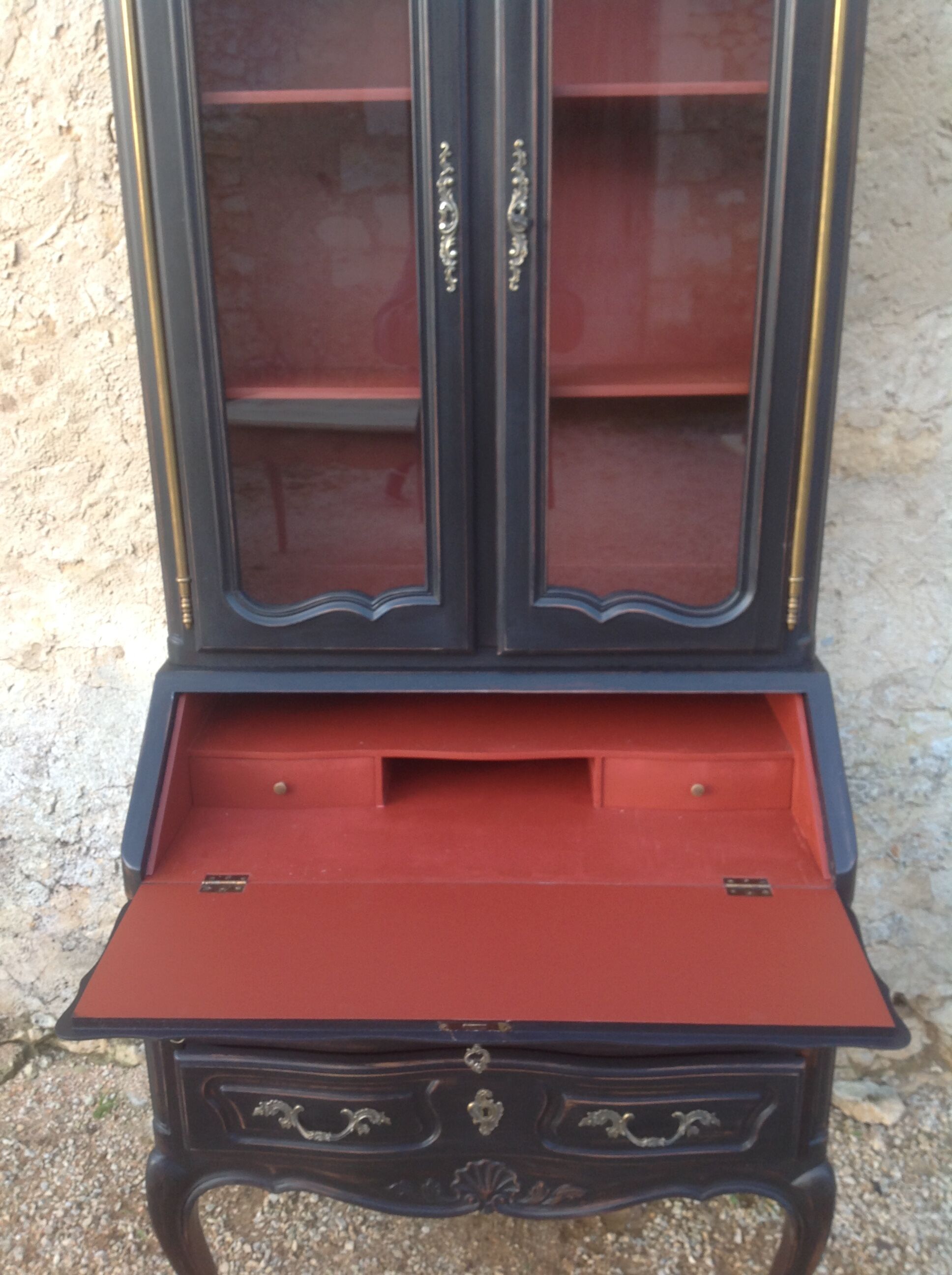 Louis XV style scriban bookcase in black and Basque red patinated cherry wood