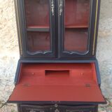 Louis XV style scriban bookcase in black and Basque red patinated cherry wood