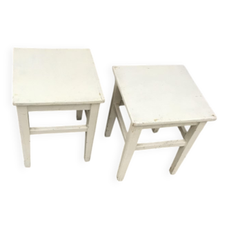 Pair of vintage 1940s white painted pine stools, rustic industrial style.