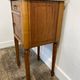 Louis XVI style bedside table, with a marble top and marquetry.