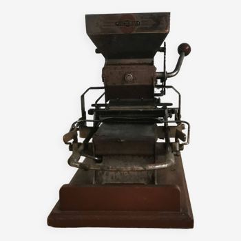 Antique cigarette rolling machine