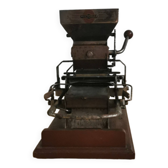 Antique cigarette rolling machine