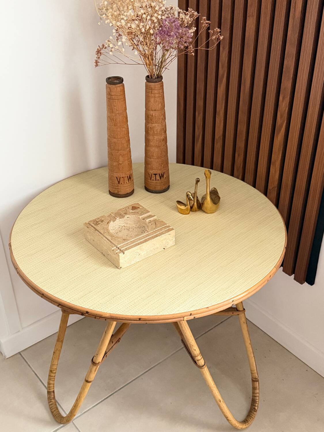 Vintage round tripod side table in rattan