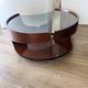 Italian Space Age coffee table in curved wood and smoked glass – 1970s