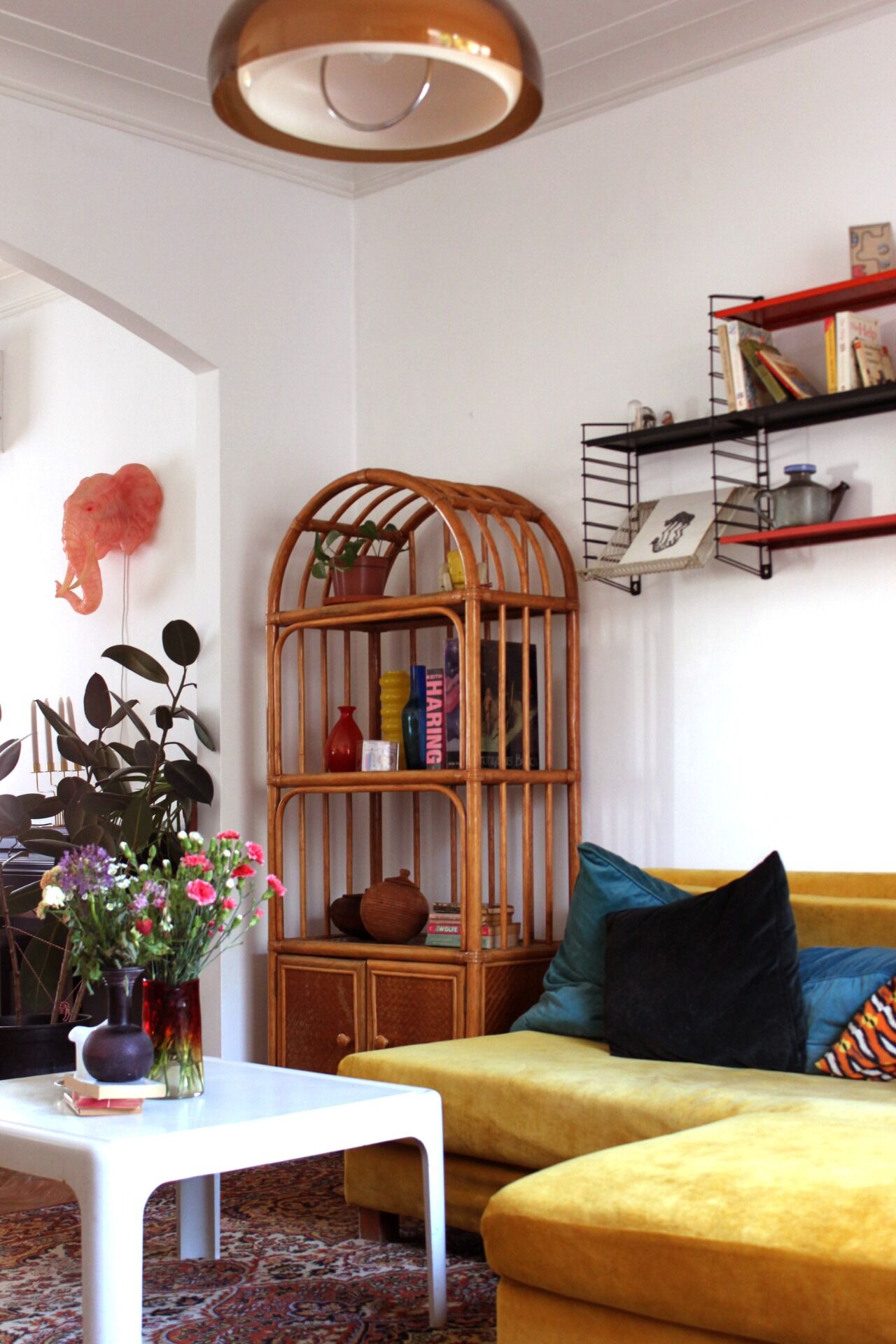 Woven rattan and bent bamboo arched bookcase display high wall cabinet.