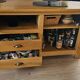 Buffet / TV unit in solid oak with a caned door.